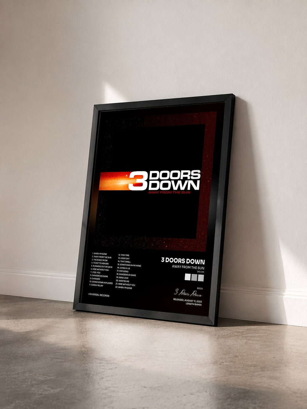 #noir Tableau de l'album Away From The Sun (Deluxe) de 3 Doors Down vu de trois quarts, cadre noir