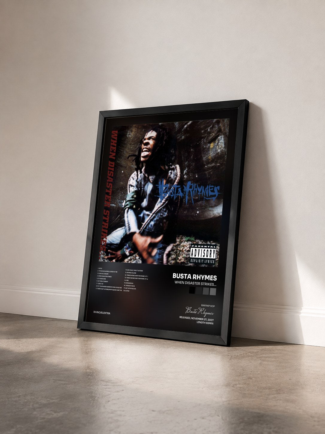 #noir Tableau de l'album When Disaster Strikes... de Busta Rhymes vu de trois quarts, cadre noir