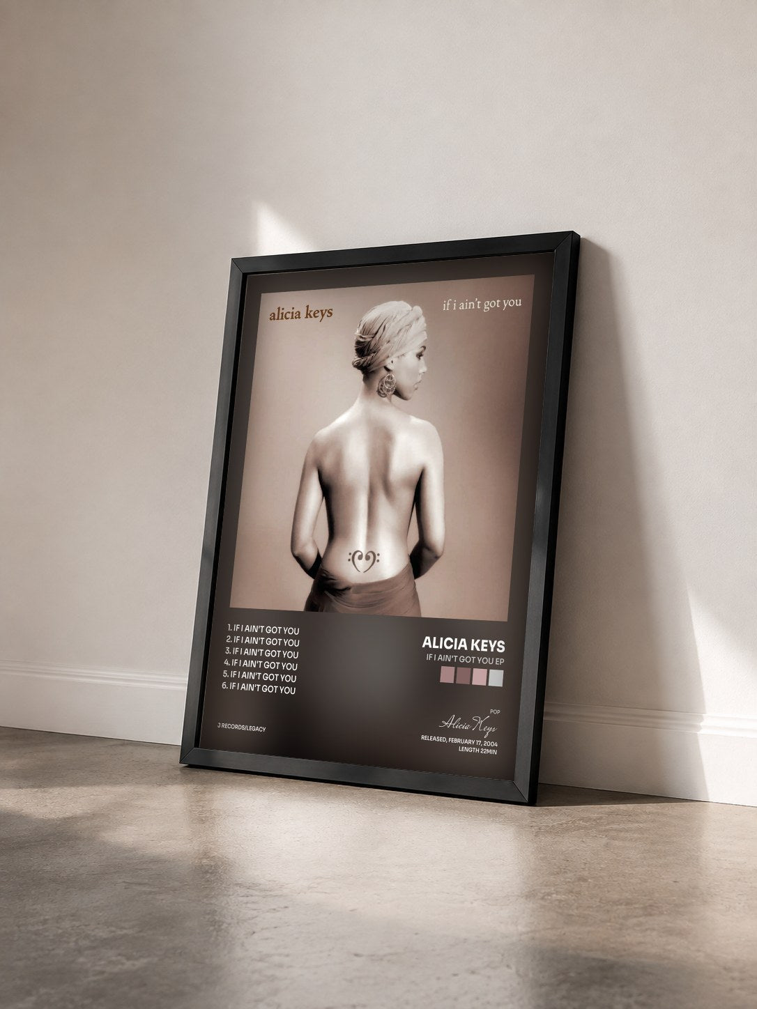 #noir Tableau de l'album If I Ain't Got You EP de Alicia Keys vu de trois quarts, cadre noir