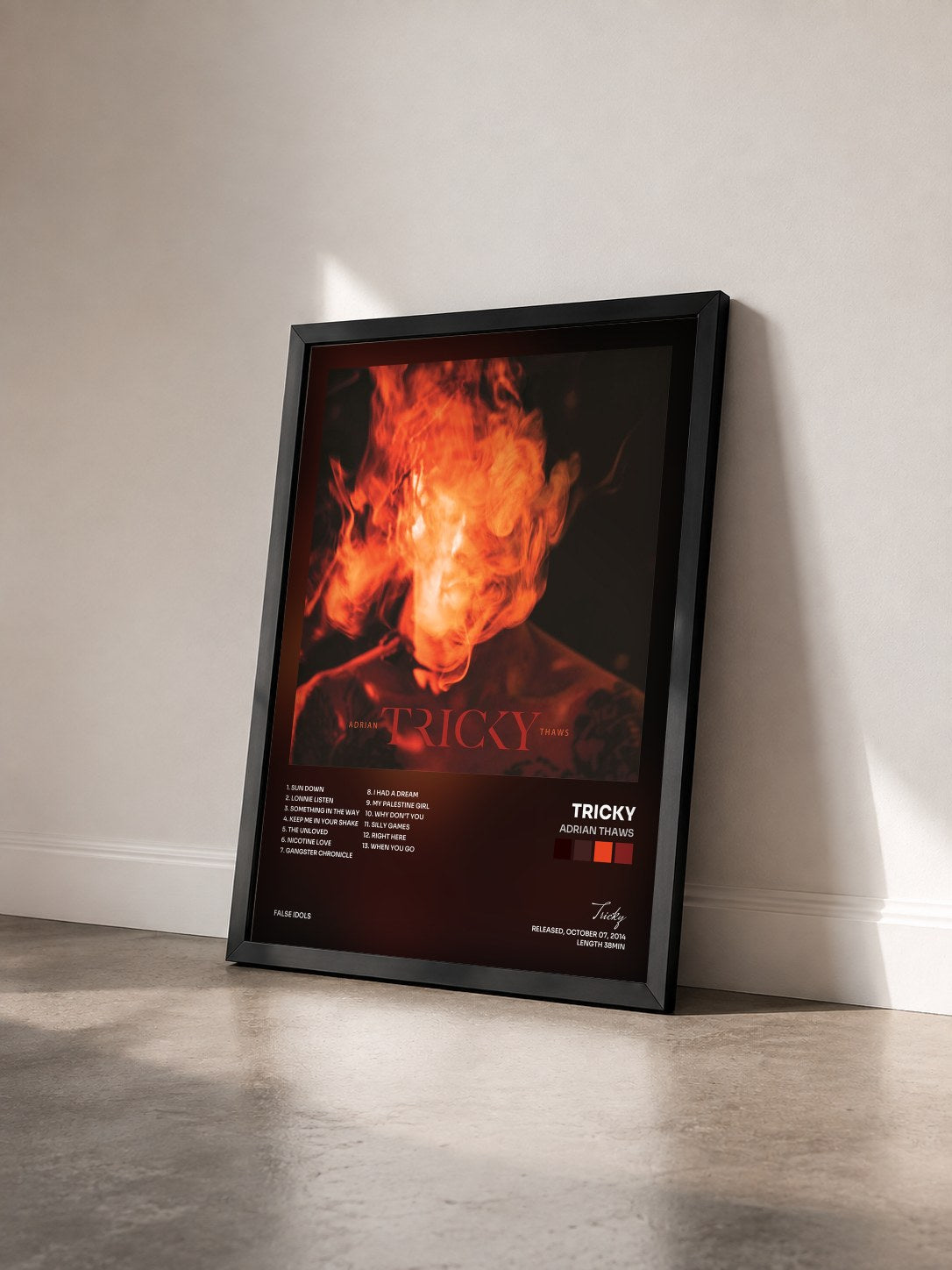 #noir Tableau de l'album Adrian Thaws de Tricky vu de trois quarts, cadre noir