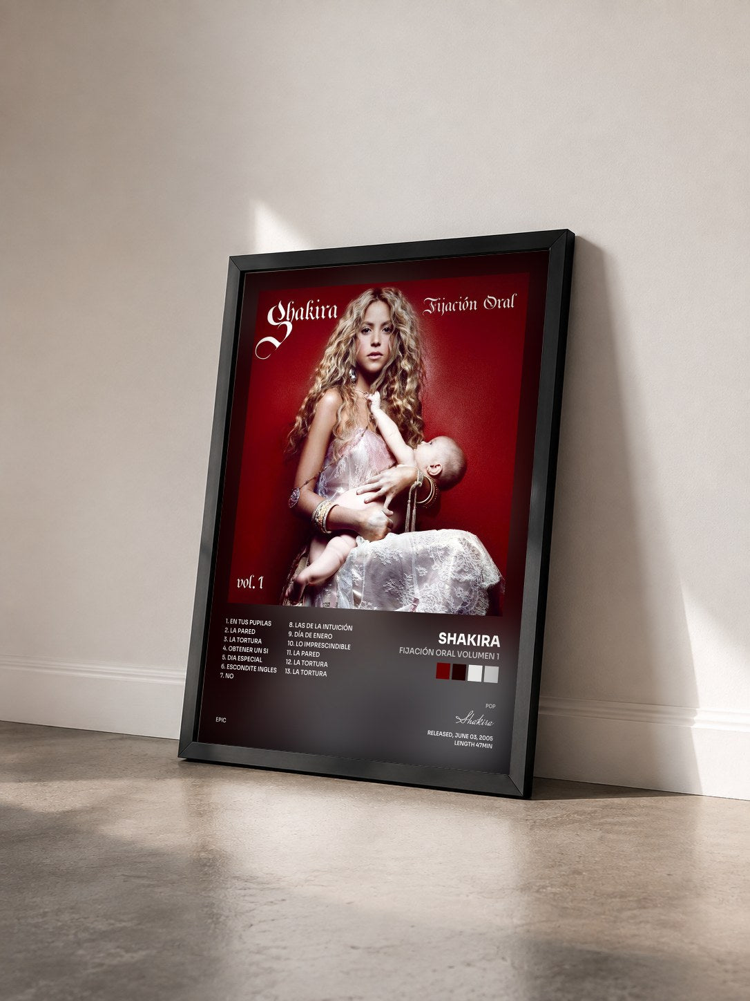 #noir Tableau de l'album Fijación Oral Volumen 1 de Shakira vu de trois quarts, cadre noir