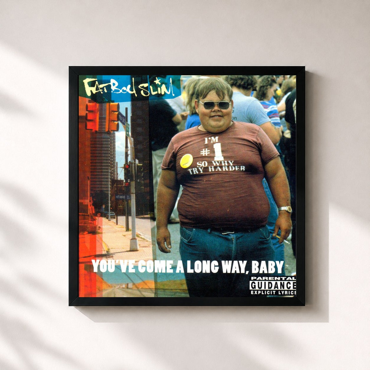 #noir Tableau carré de l'album You've Come a Long Way Baby de Fatboy Slim, cadre noir 32x32 cm