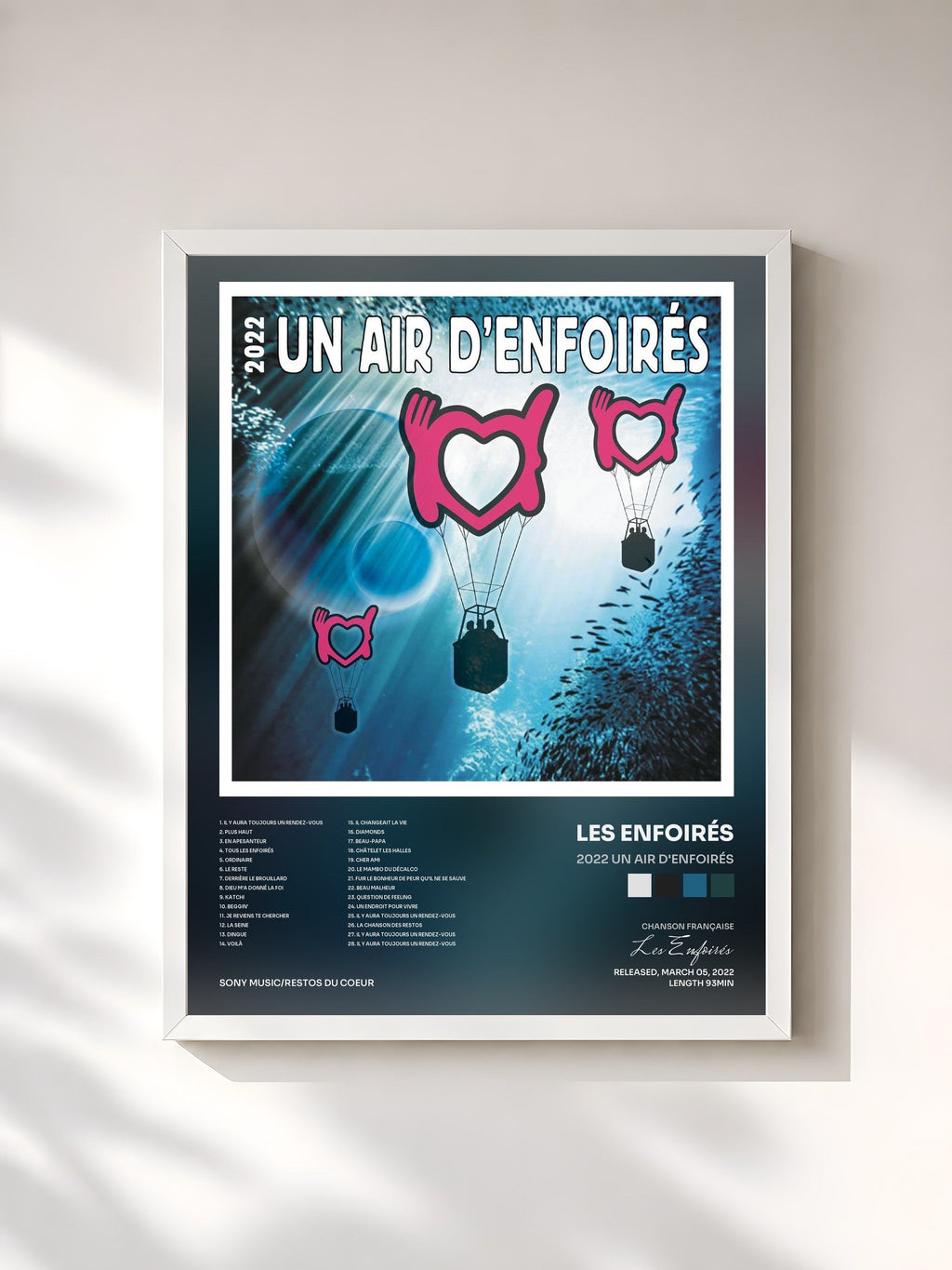 #blanc 2022 Un air d'Enfoirés by Les Enfoirés as a framed art print, white frame, printed and framed in France