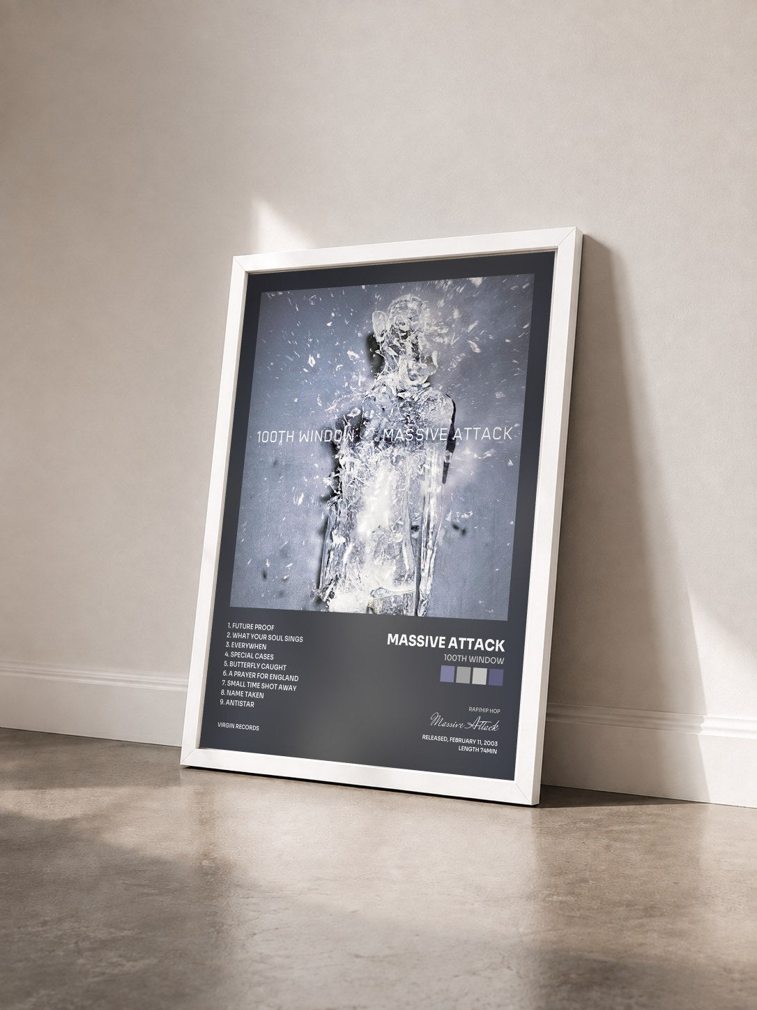 #blanc Tableau de l'album 100th Window de Massive Attack vu de trois quarts, cadre blanc