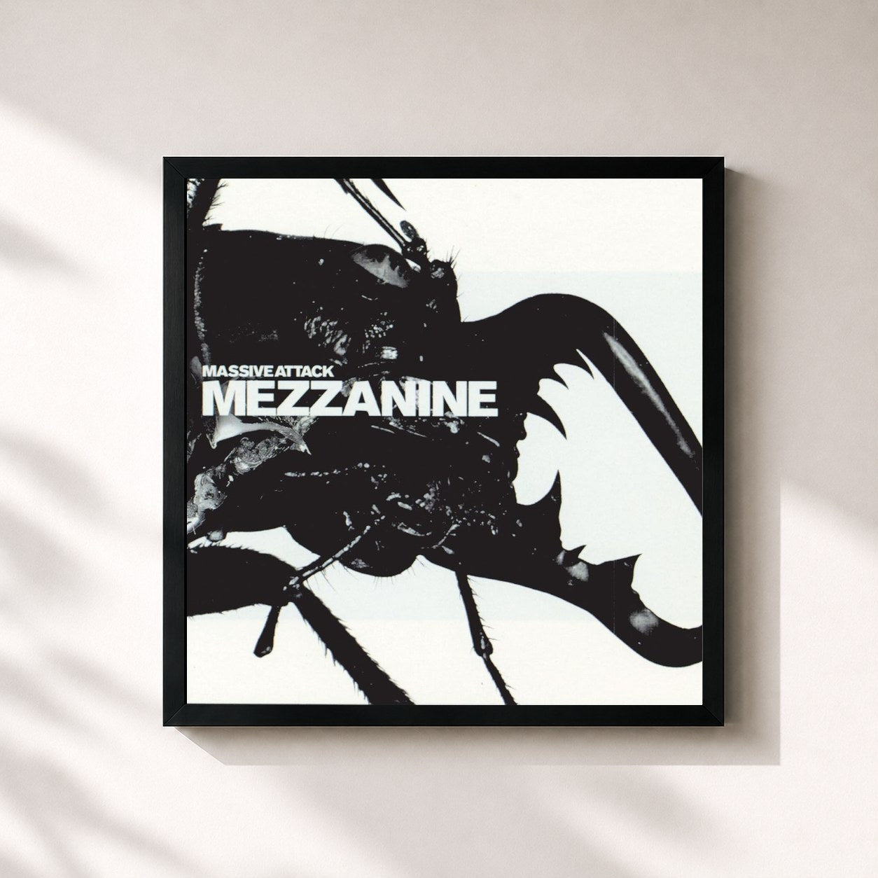 #noir Mezzanine by Massive Attack as a square framed art print, black 32x32 cm frame