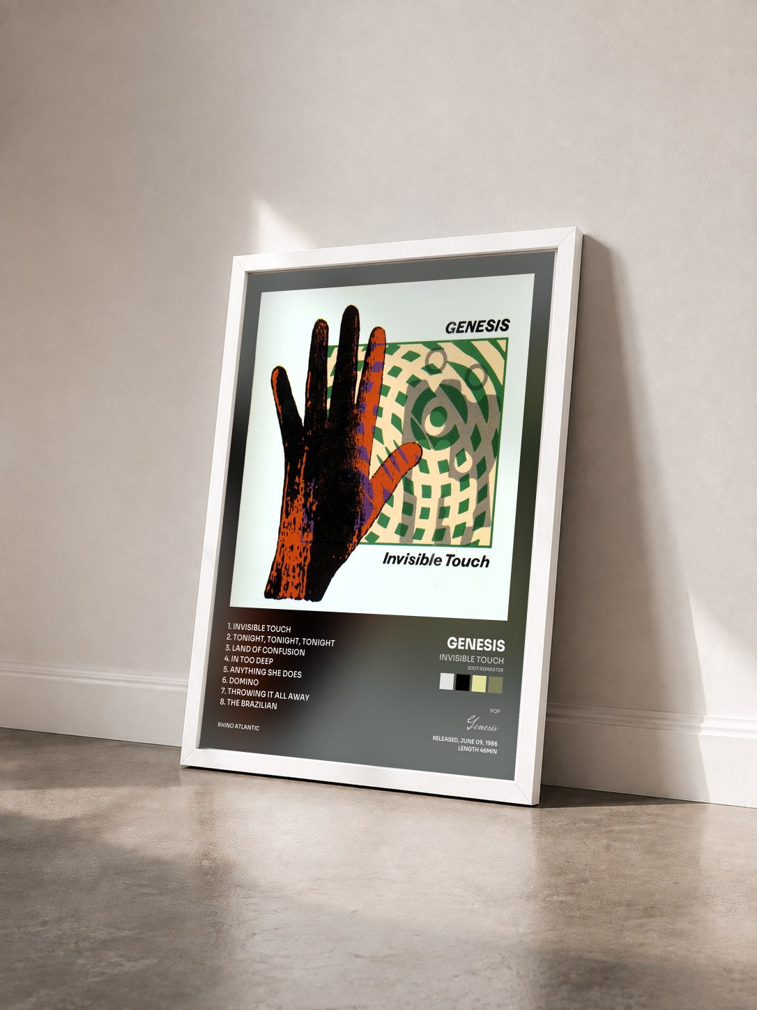 #blanc Tableau de l'album Invisible Touch (2007 Remaster) de Genesis vu de trois quarts, cadre blanc