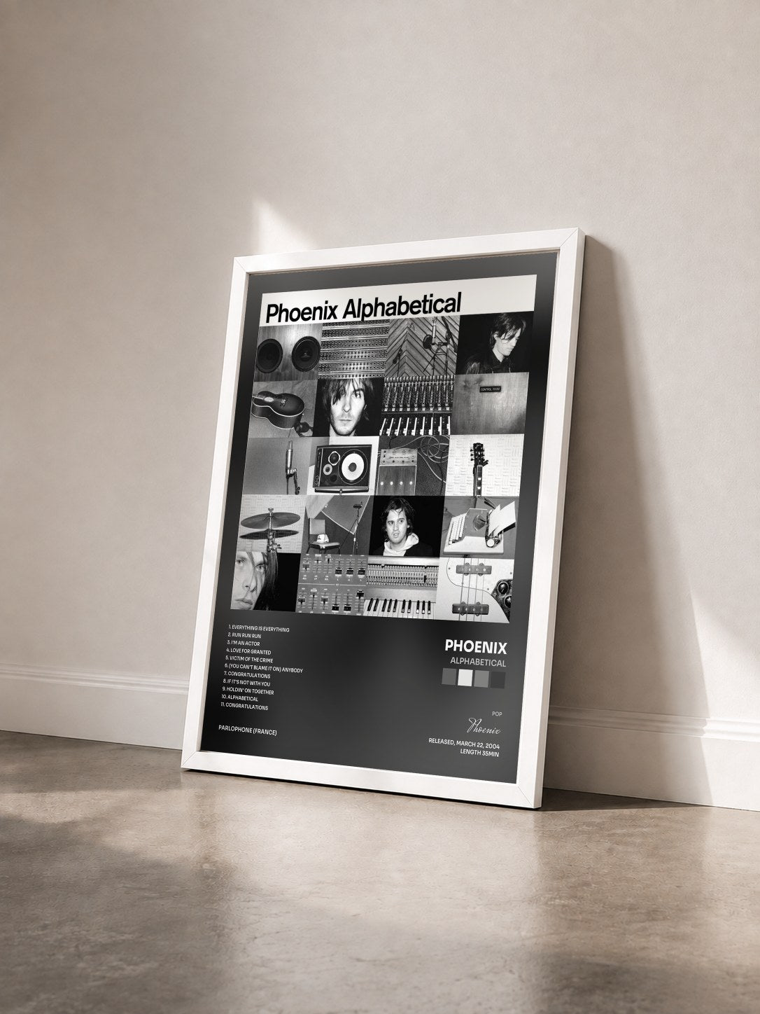 #blanc Tableau de l'album Alphabetical de Phoenix vu de trois quarts, cadre blanc
