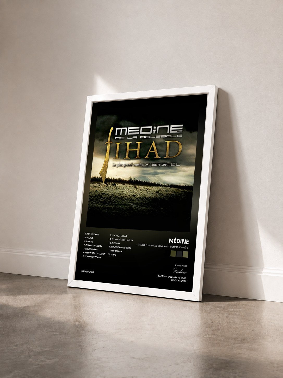 #blanc Tableau de l'album Jihad le plus grand combat est contre soi-même de Médine vu de trois quarts, cadre blanc