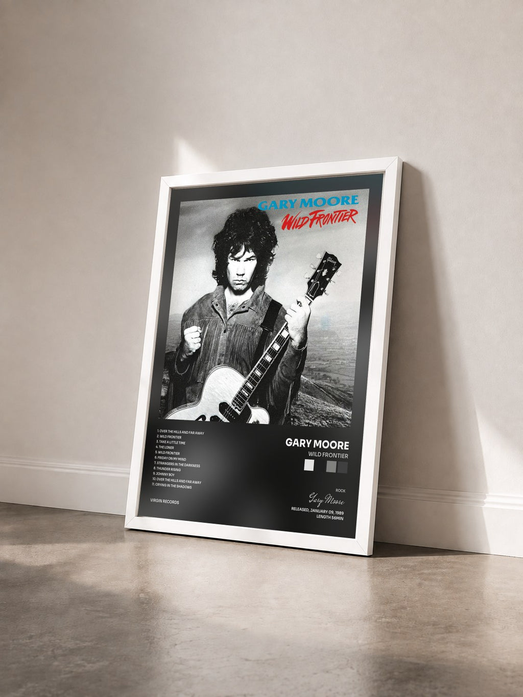 #blanc Wild Frontier by Gary Moore as a framed art print seen at an angle, white frame
