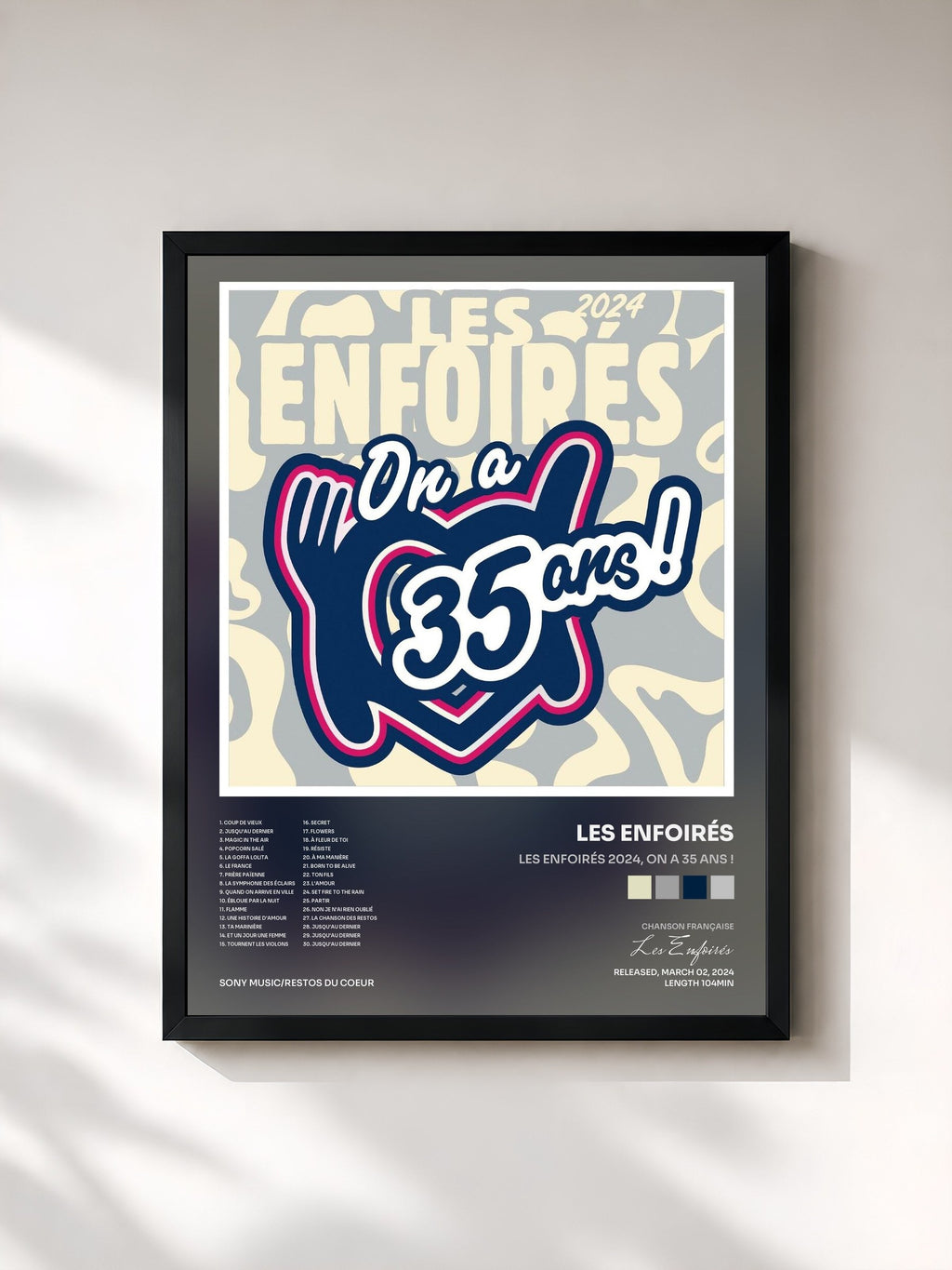 #noir Tableau de l'album Les Enfoirés 2024, On a 35 ans ! de Les Enfoirés, cadre noir, imprimé et encadré en France