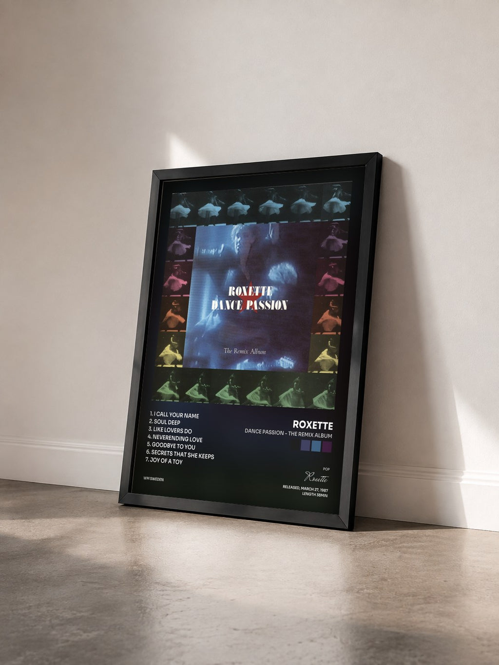 #noir Dance Passion - The Remix Album by Roxette as a framed art print seen at an angle, black frame