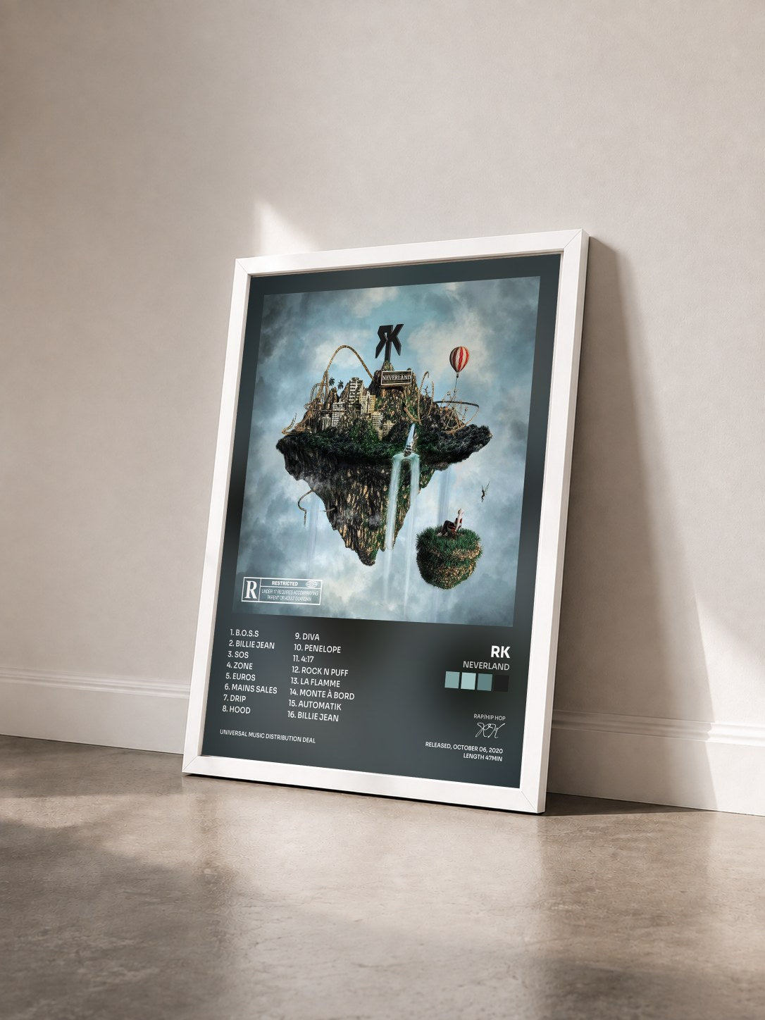 #blanc Tableau de l'album Neverland de RK vu de trois quarts, cadre blanc