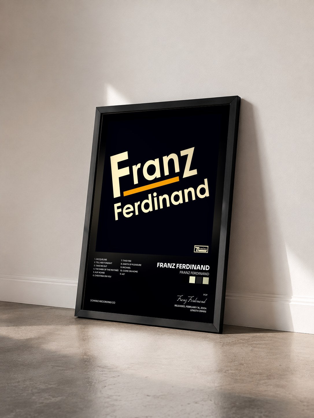 #noir Franz Ferdinand by Franz Ferdinand as a framed art print seen at an angle, black frame