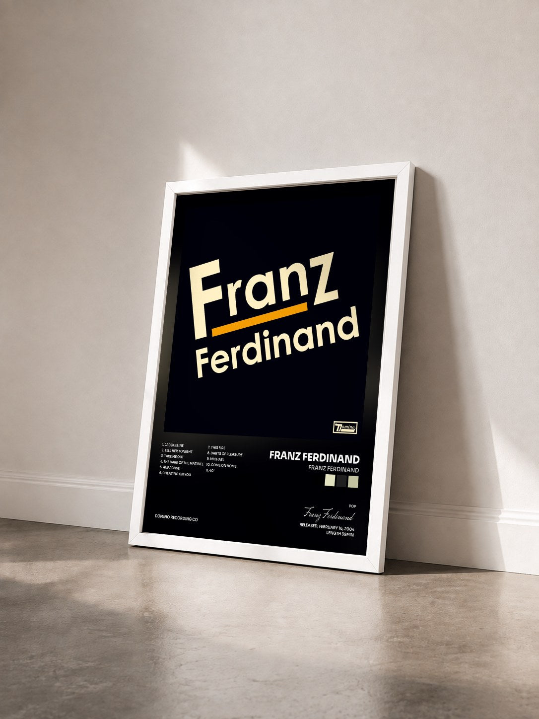 #blanc Franz Ferdinand by Franz Ferdinand as a framed art print seen at an angle, white frame