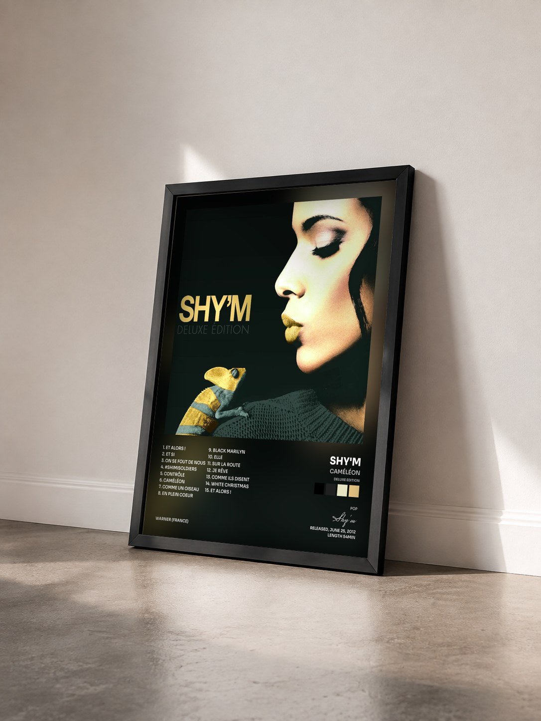 #noir Caméléon (Deluxe Edition) by Shy'm as a framed art print seen at an angle, black frame