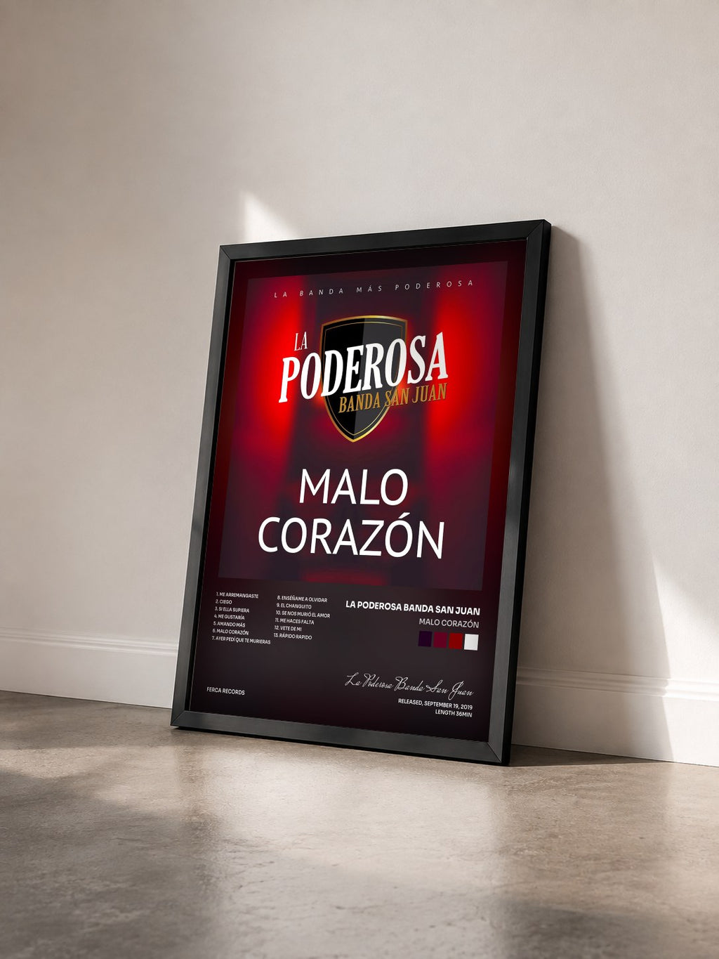 #noir Tableau de l'album Malo Corazón de La Poderosa Banda San Juan vu de trois quarts, cadre noir