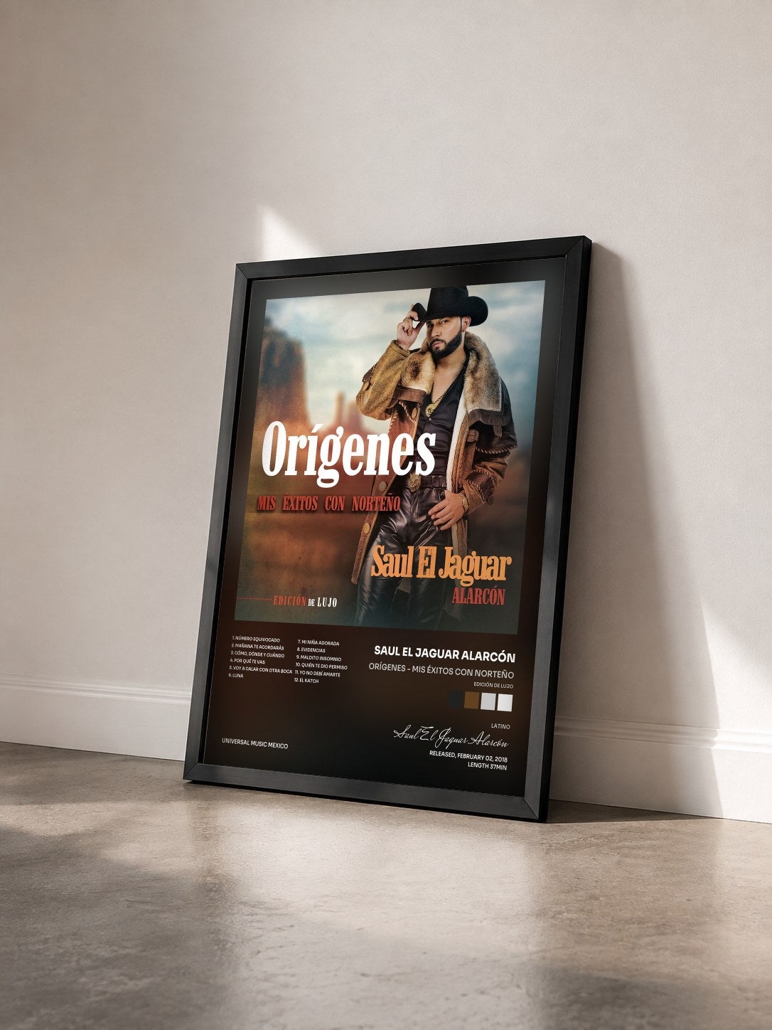 #noir Tableau de l'album Orígenes - Mis Éxitos Con Norteño (Edición De Lujo) de Saul El Jaguar Alarcón vu de trois quarts, cadre noir