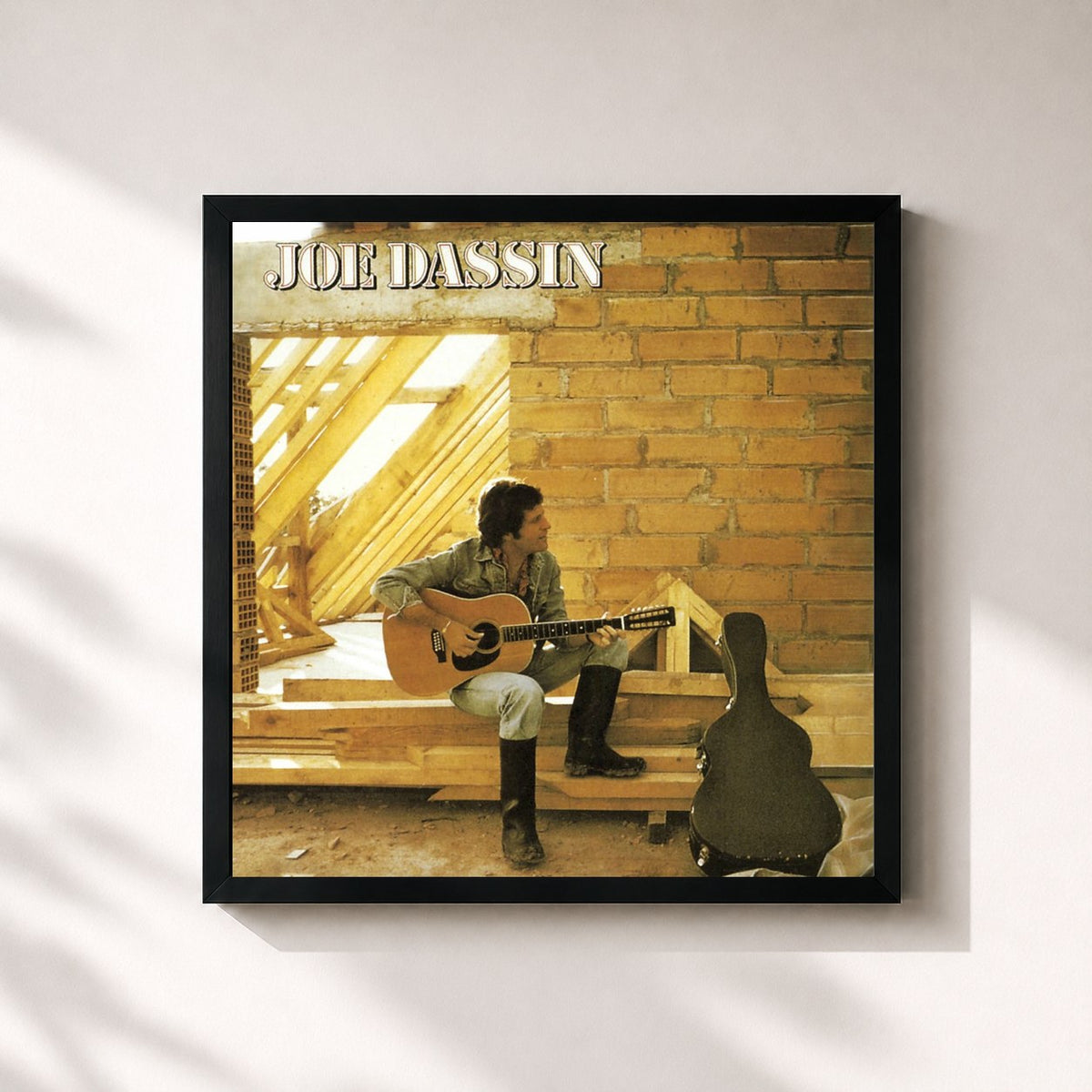 #noir Joe Dassin by Joe Dassin as a square framed art print, black 32x32 cm frame