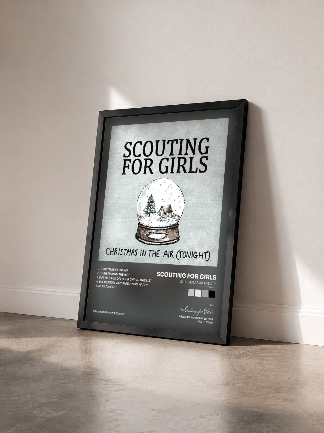 #noir Tableau de l'album Christmas in the Air (Tonight) de Scouting for Girls vu de trois quarts, cadre noir