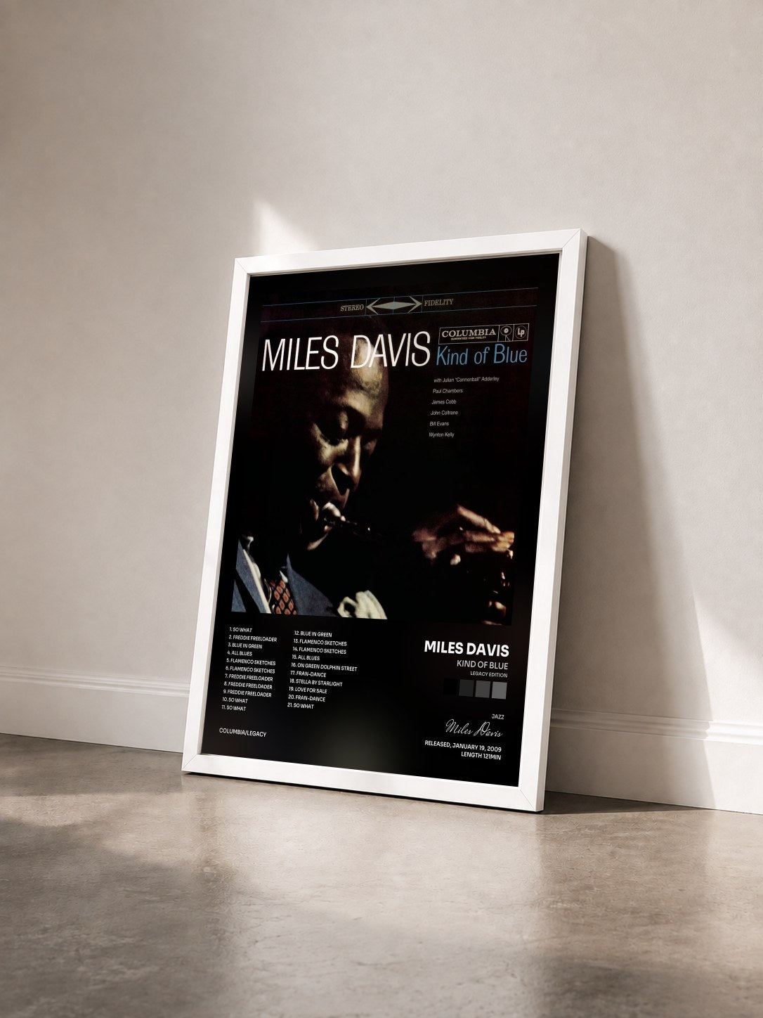 #blanc Kind Of Blue (Legacy Edition) by Miles Davis as a framed art print seen at an angle, white frame