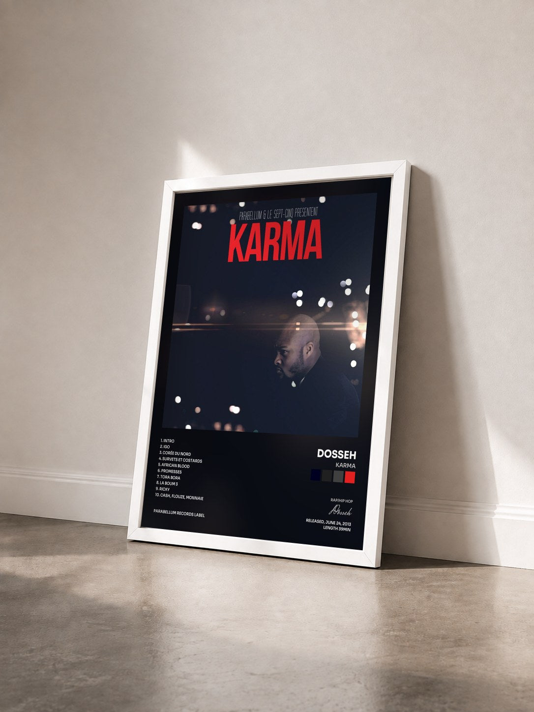 #blanc Tableau de l'album Karma de Dosseh vu de trois quarts, cadre blanc