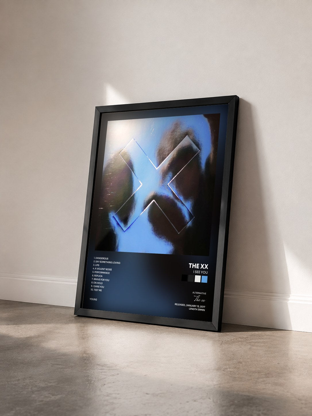 #noir I See You by The xx as a framed art print seen at an angle, black frame