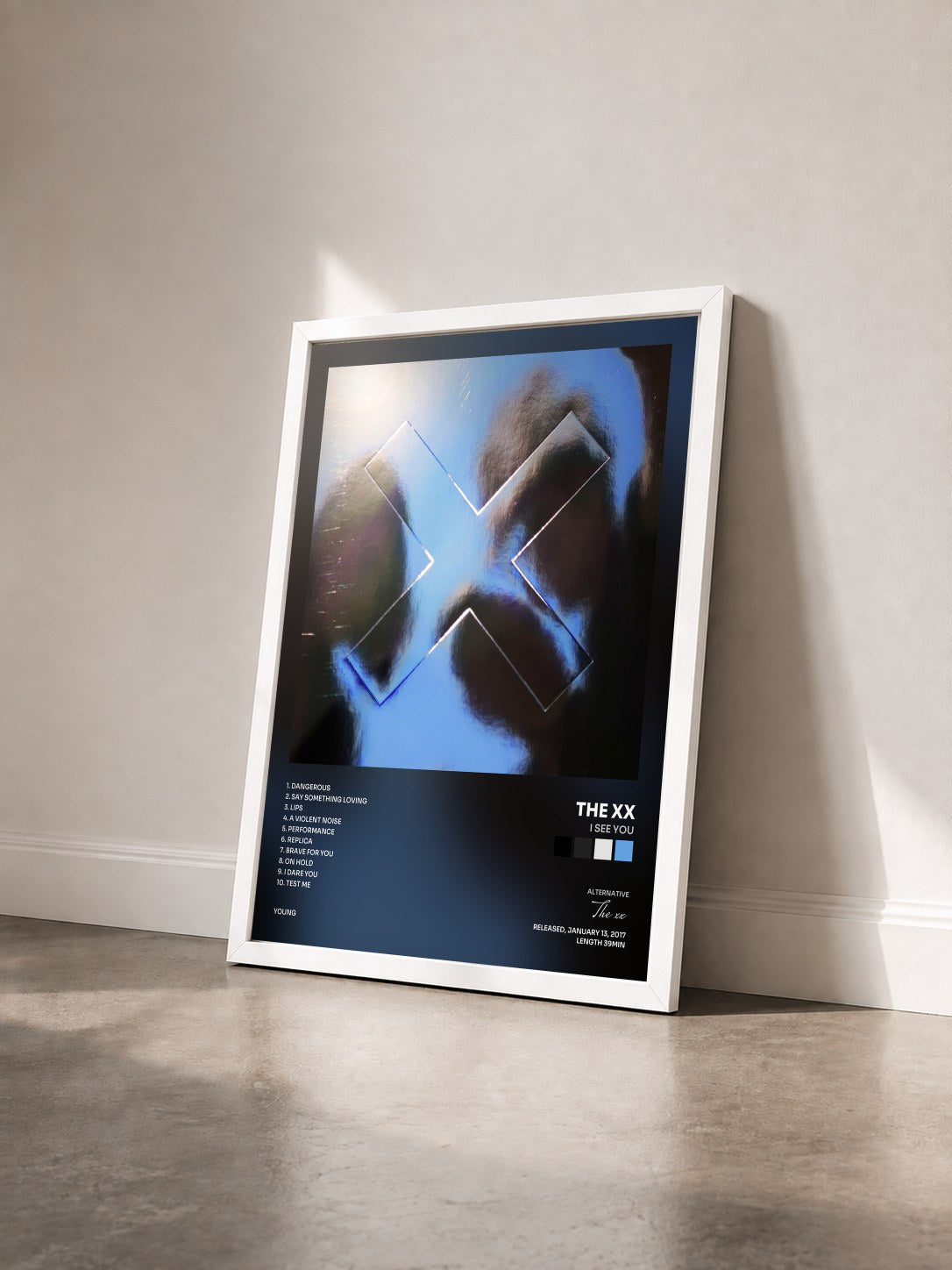 #blanc I See You by The xx as a framed art print seen at an angle, white frame