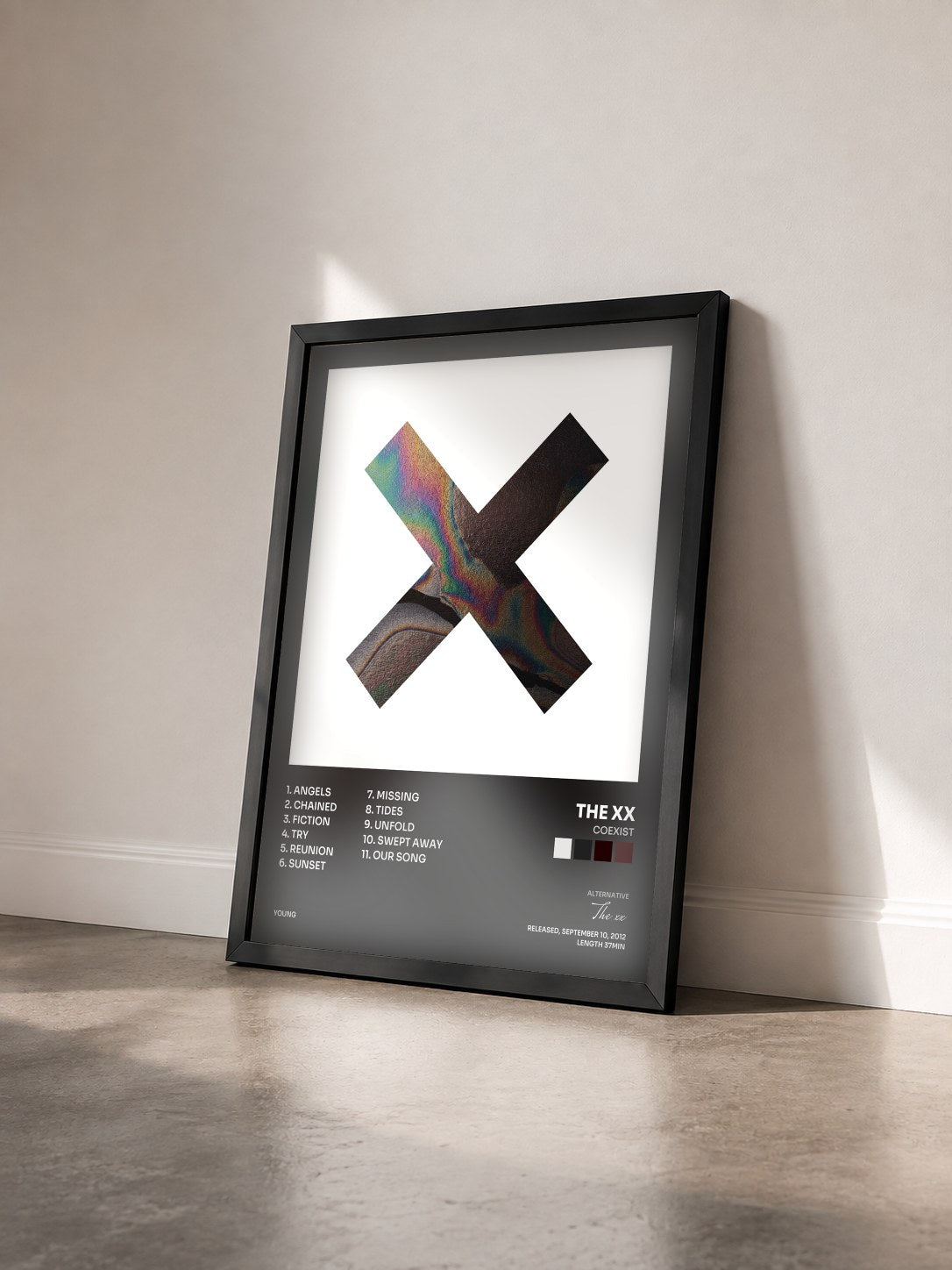 #noir Tableau de l'album Coexist de The xx vu de trois quarts, cadre noir