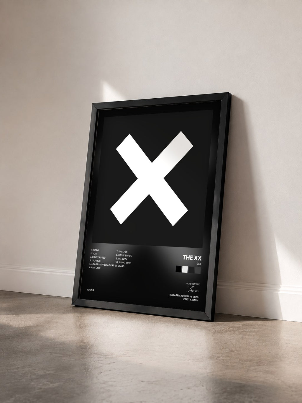 #noir Tableau de l'album xx de The xx vu de trois quarts, cadre noir
