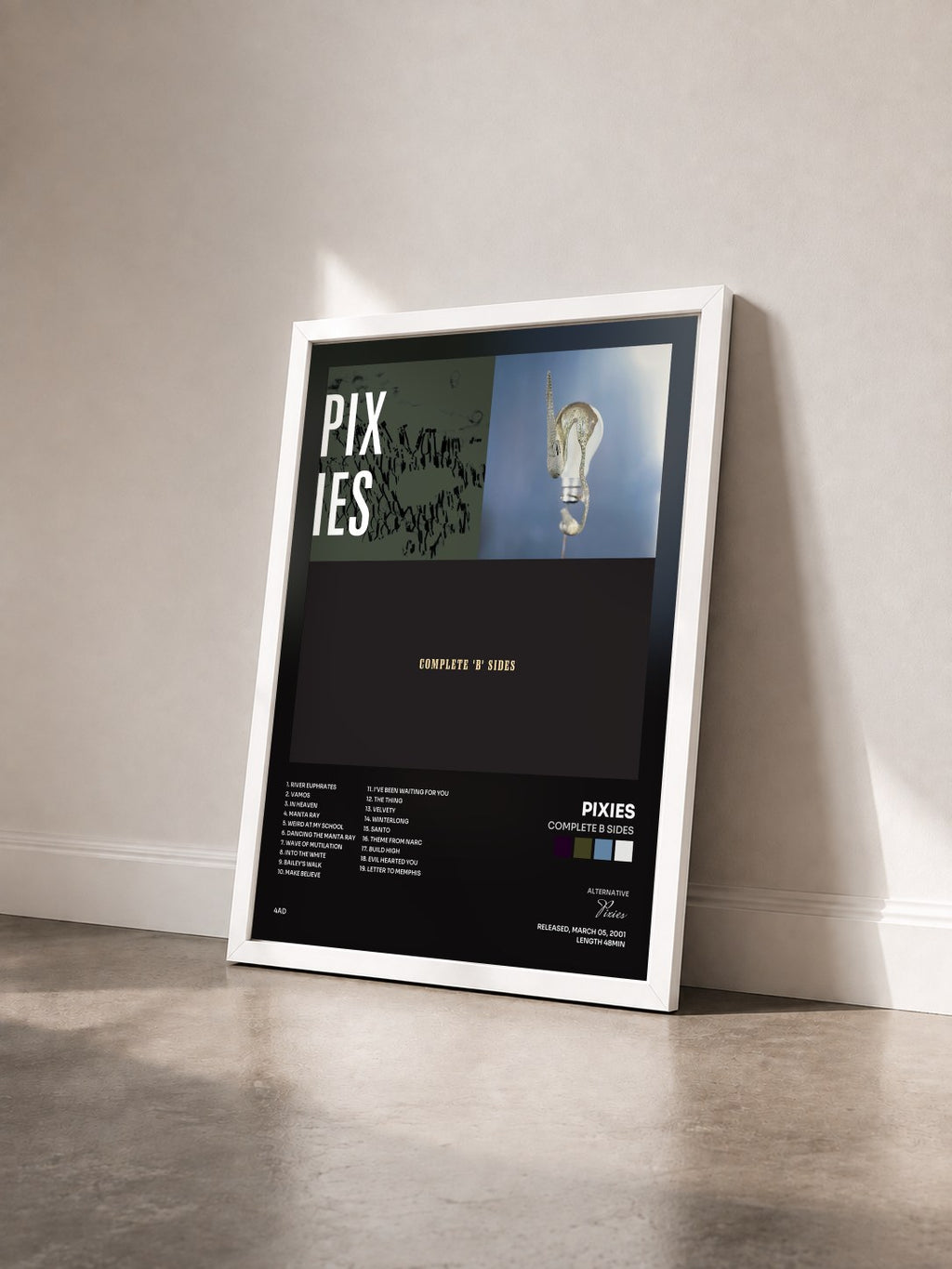 #blanc Tableau de l'album Complete B Sides de Pixies vu de trois quarts, cadre blanc