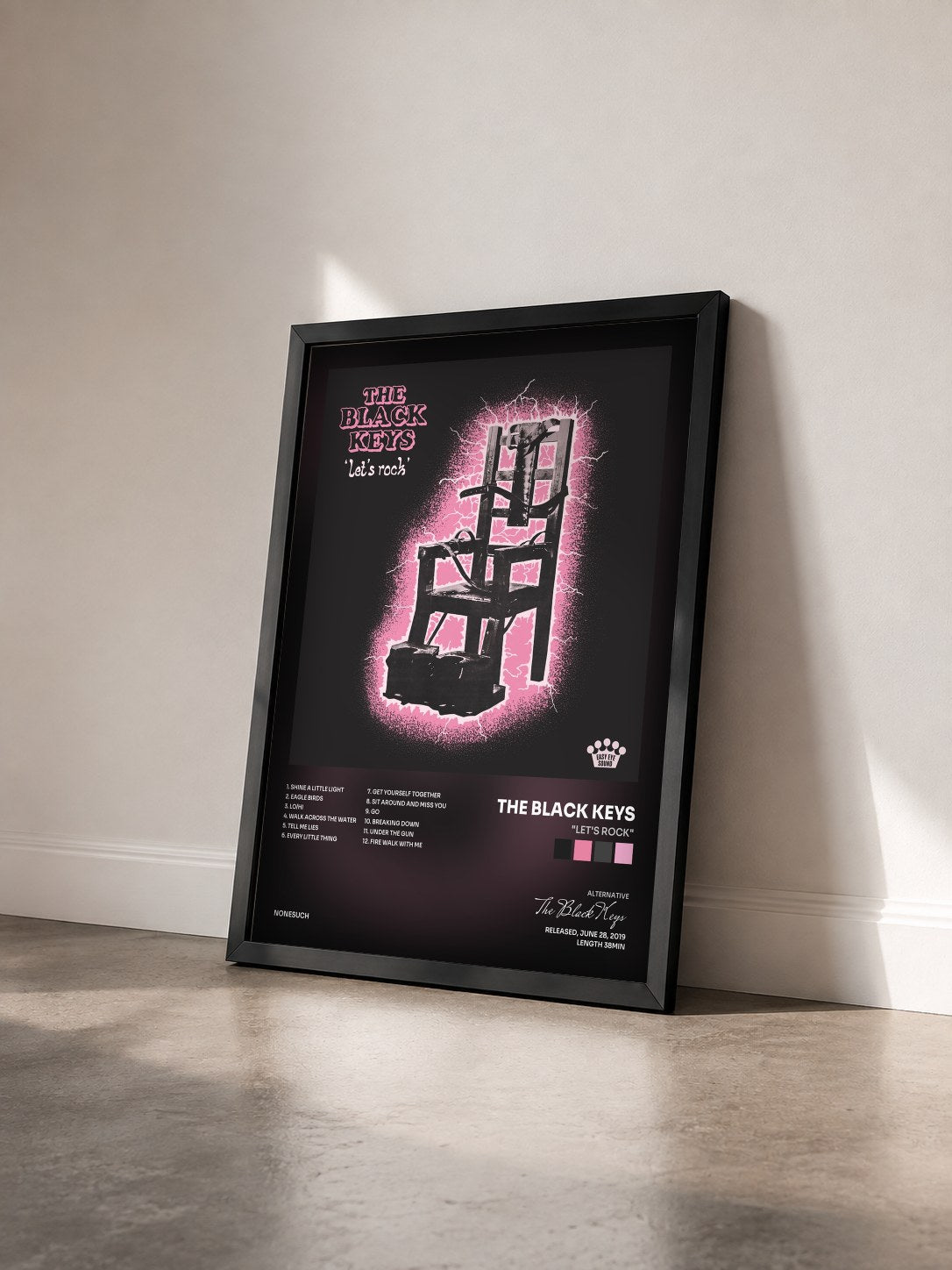 #noir Tableau de l'album "Let's Rock" de The Black Keys vu de trois quarts, cadre noir