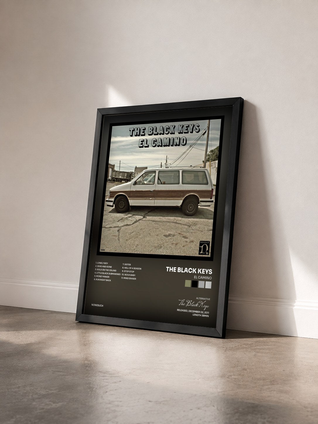 #noir Tableau de l'album El Camino de The Black Keys vu de trois quarts, cadre noir