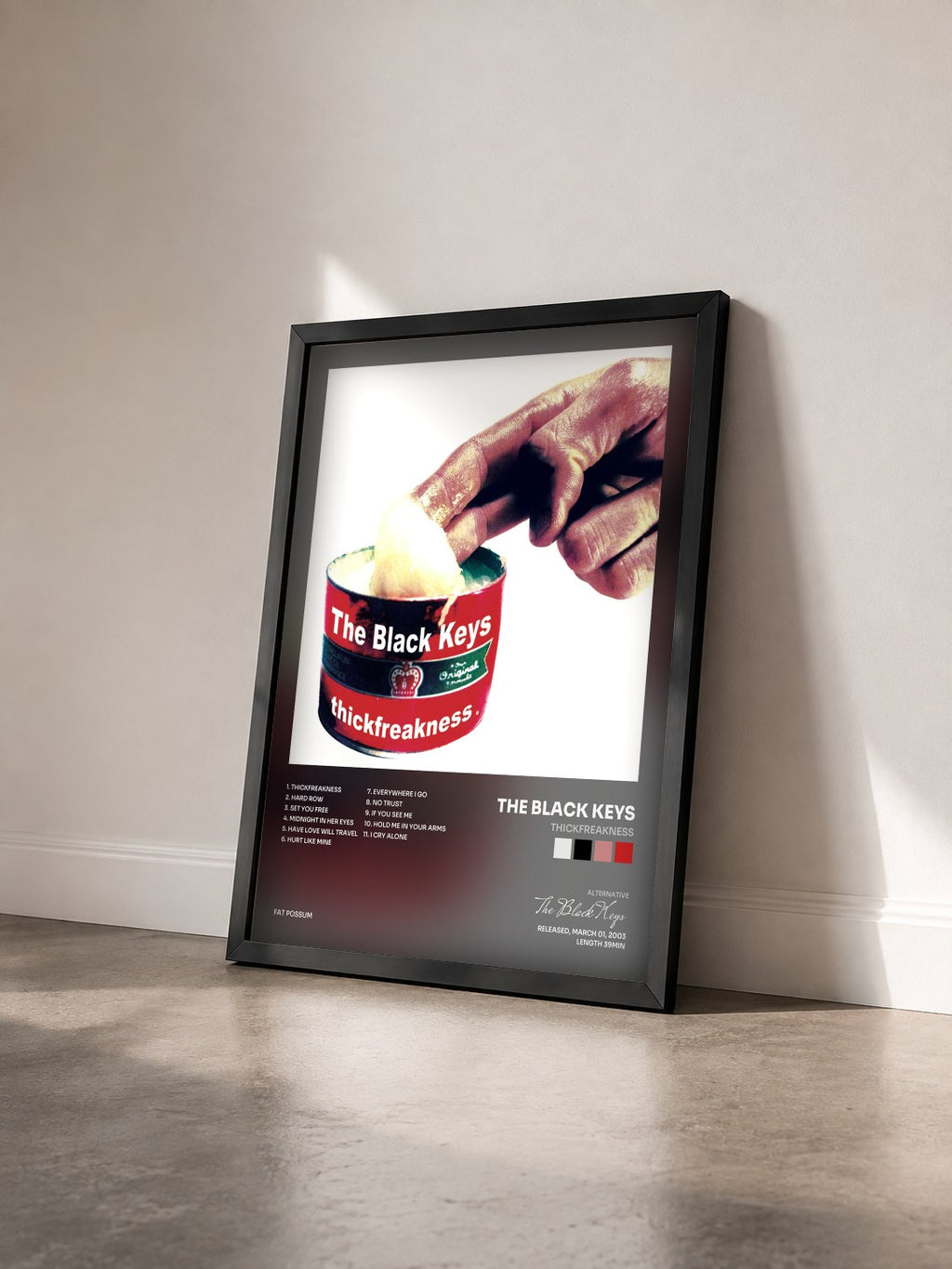 #noir Thickfreakness by The Black Keys as a framed art print seen at an angle, black frame