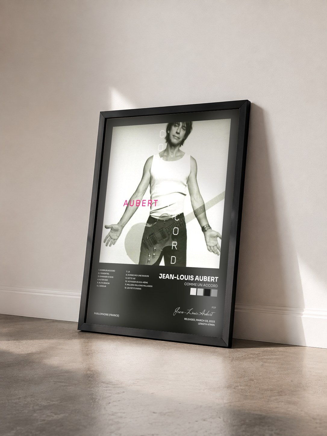 #noir comme un accord by Jean-Louis Aubert as a framed art print seen at an angle, black frame