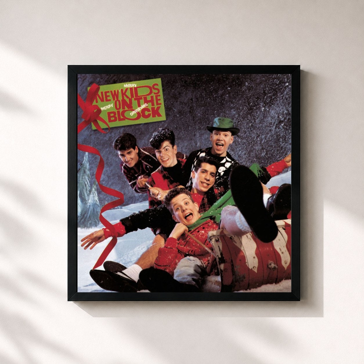 #noir Tableau carré de l'album Merry, Merry Christmas de New Kids on the Block, cadre noir 32x32 cm