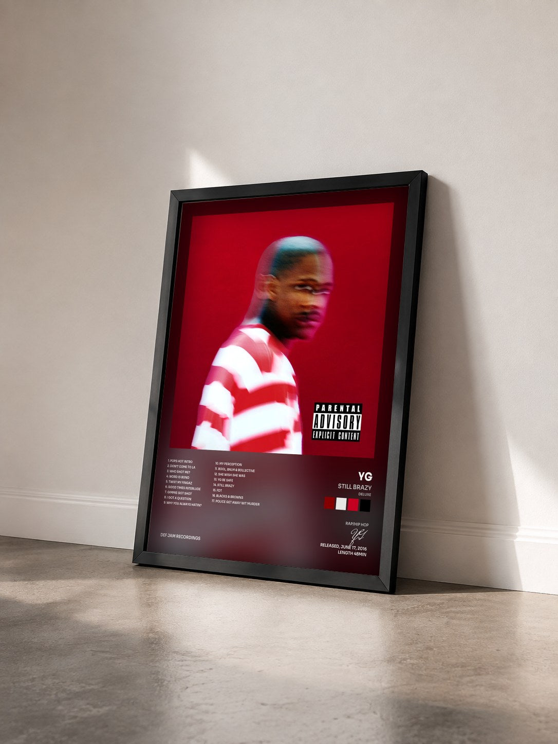 #noir Tableau de l'album Still Brazy (Deluxe) de YG vu de trois quarts, cadre noir