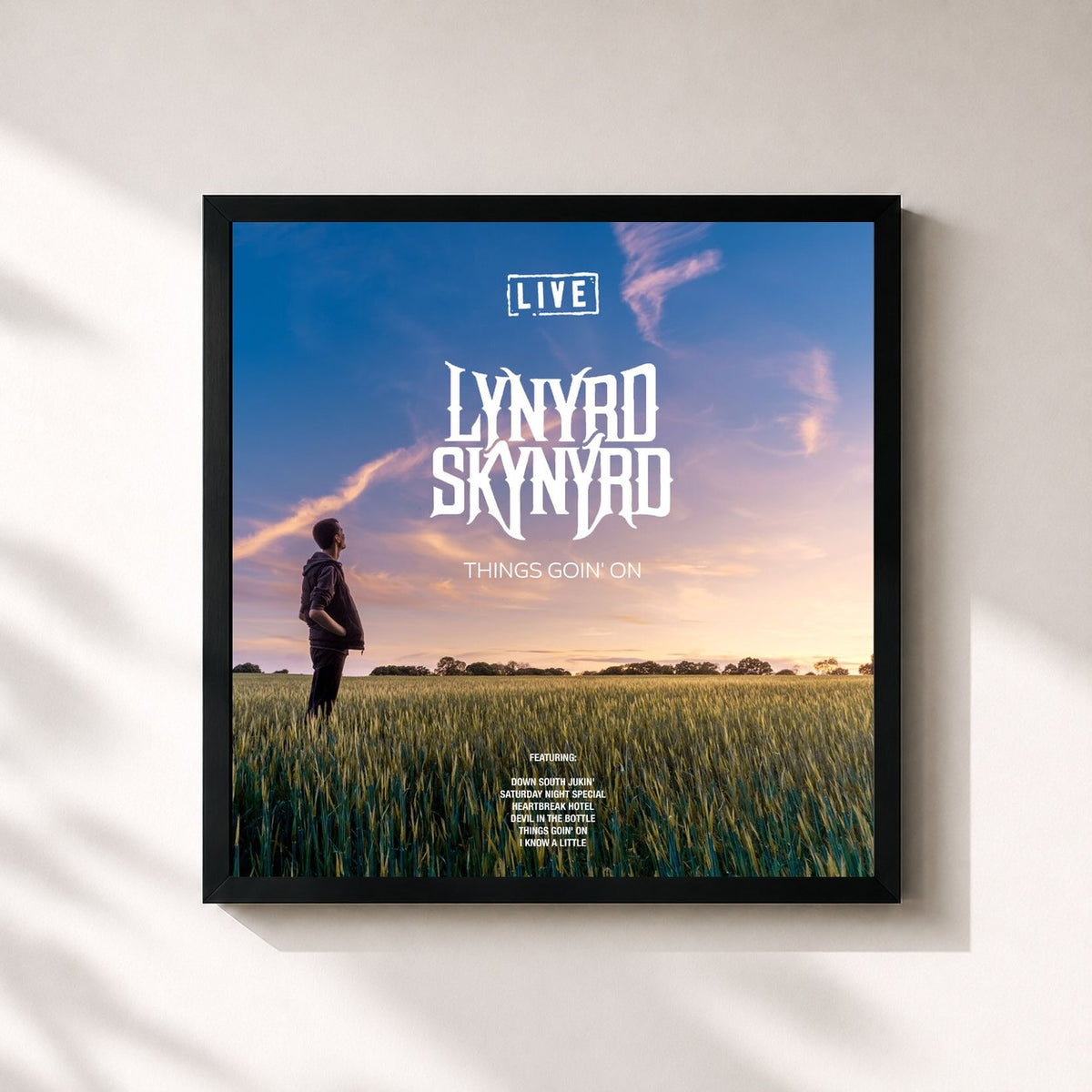 #noir Things Goin' On de Lynyrd Skynyrd en lámina cuadrada enmarcada, marco negro de 32x32 cm