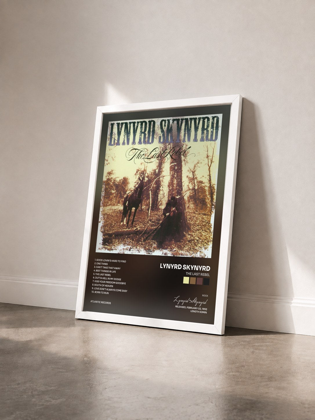 #blanc The Last Rebel de Lynyrd Skynyrd en lámina enmarcada vista de tres cuartos, marco blanco