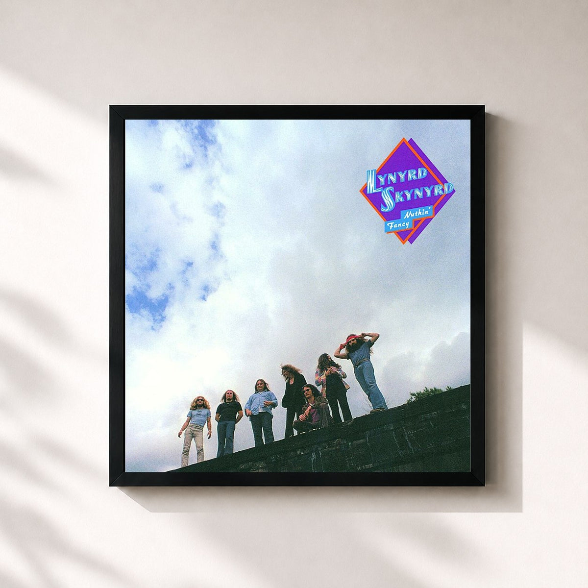#noir Nuthin' Fancy (Expanded Edition) de Lynyrd Skynyrd en lámina cuadrada enmarcada, marco negro de 32x32 cm