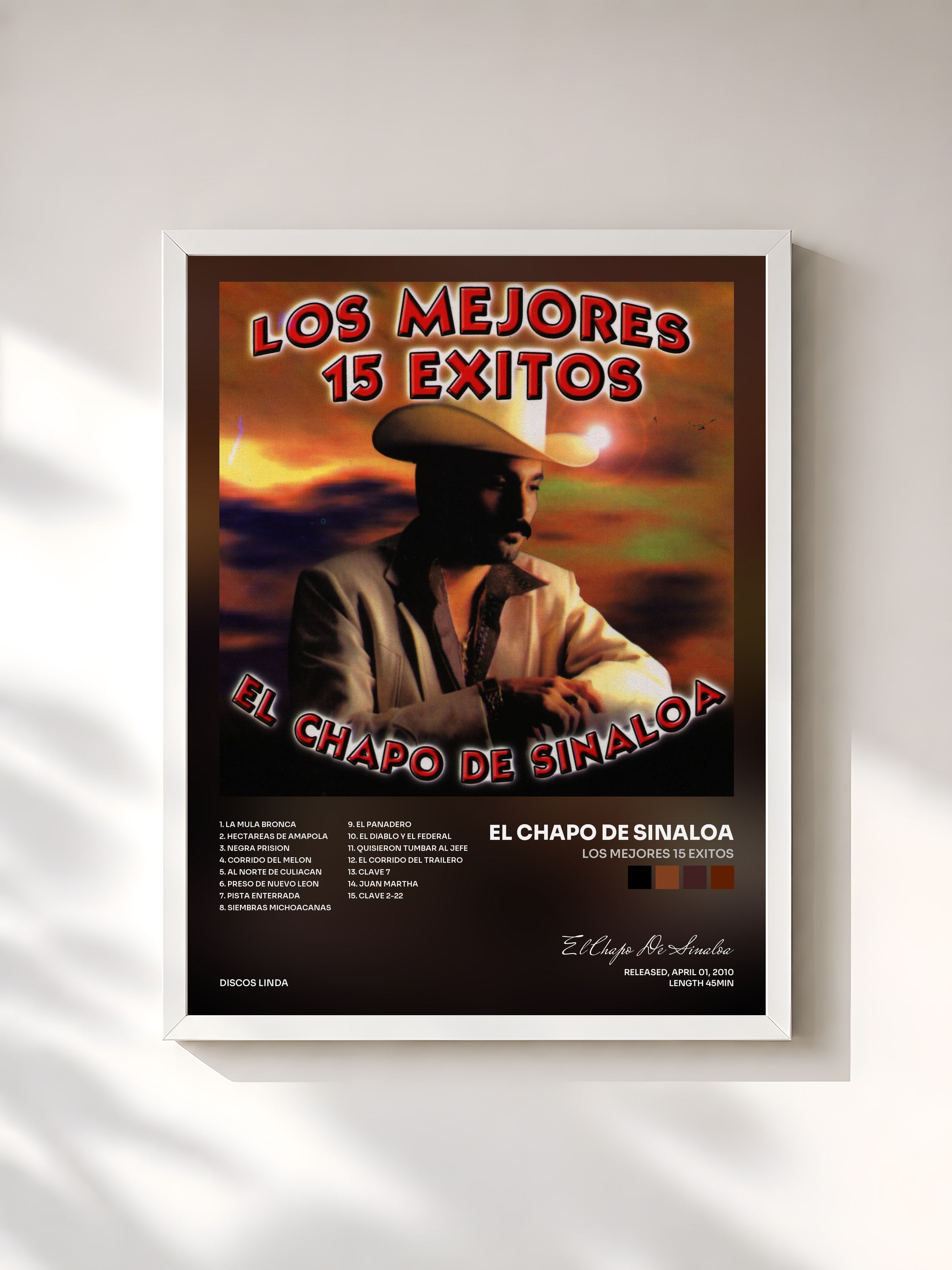 #blanc Tableau de l'album Los Mejores 15 Exitos de El Chapo De Sinaloa, cadre blanc, imprimé et encadré en France