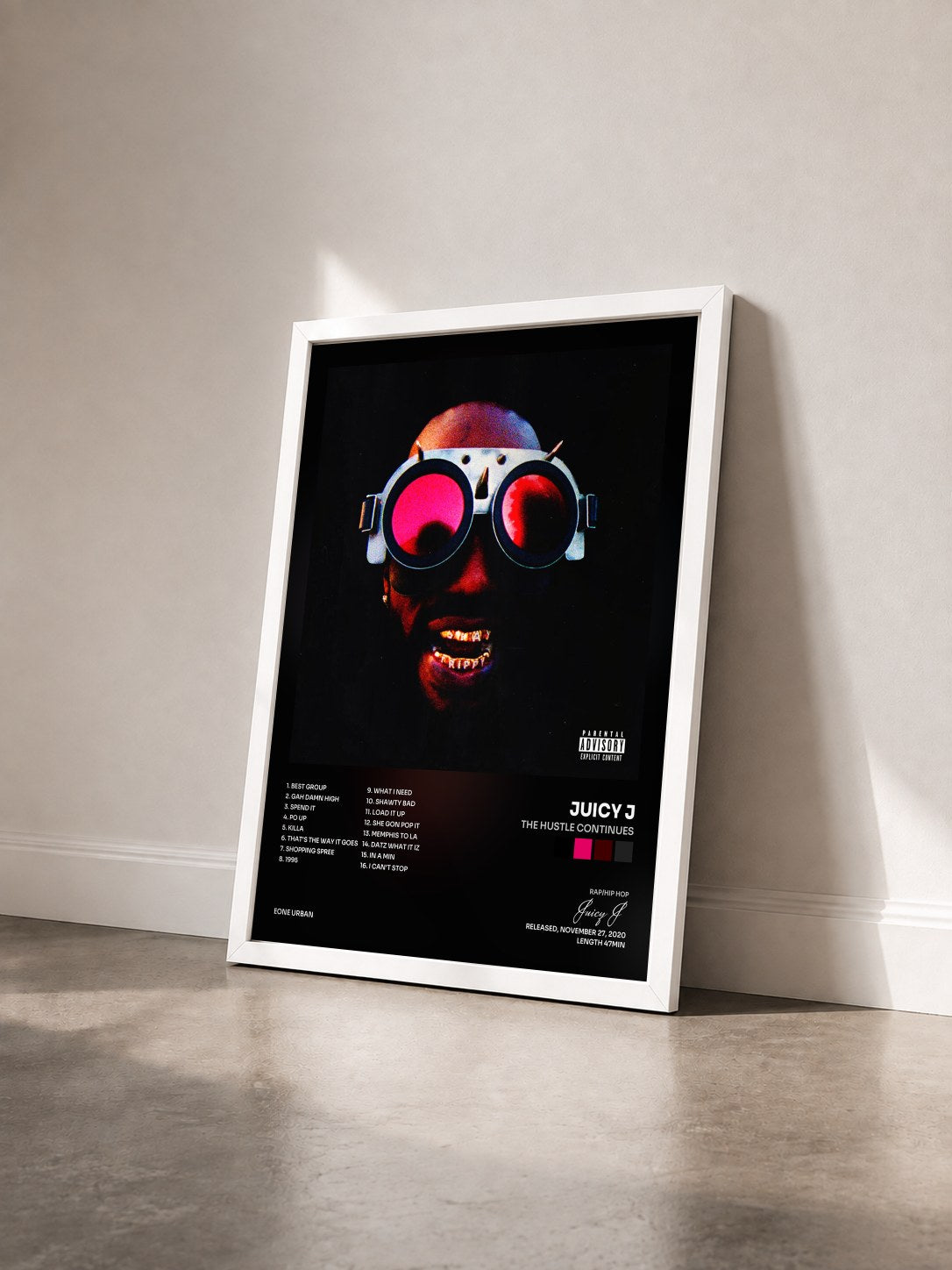 #blanc Tableau de l'album THE HUSTLE CONTINUES de Juicy J vu de trois quarts, cadre blanc