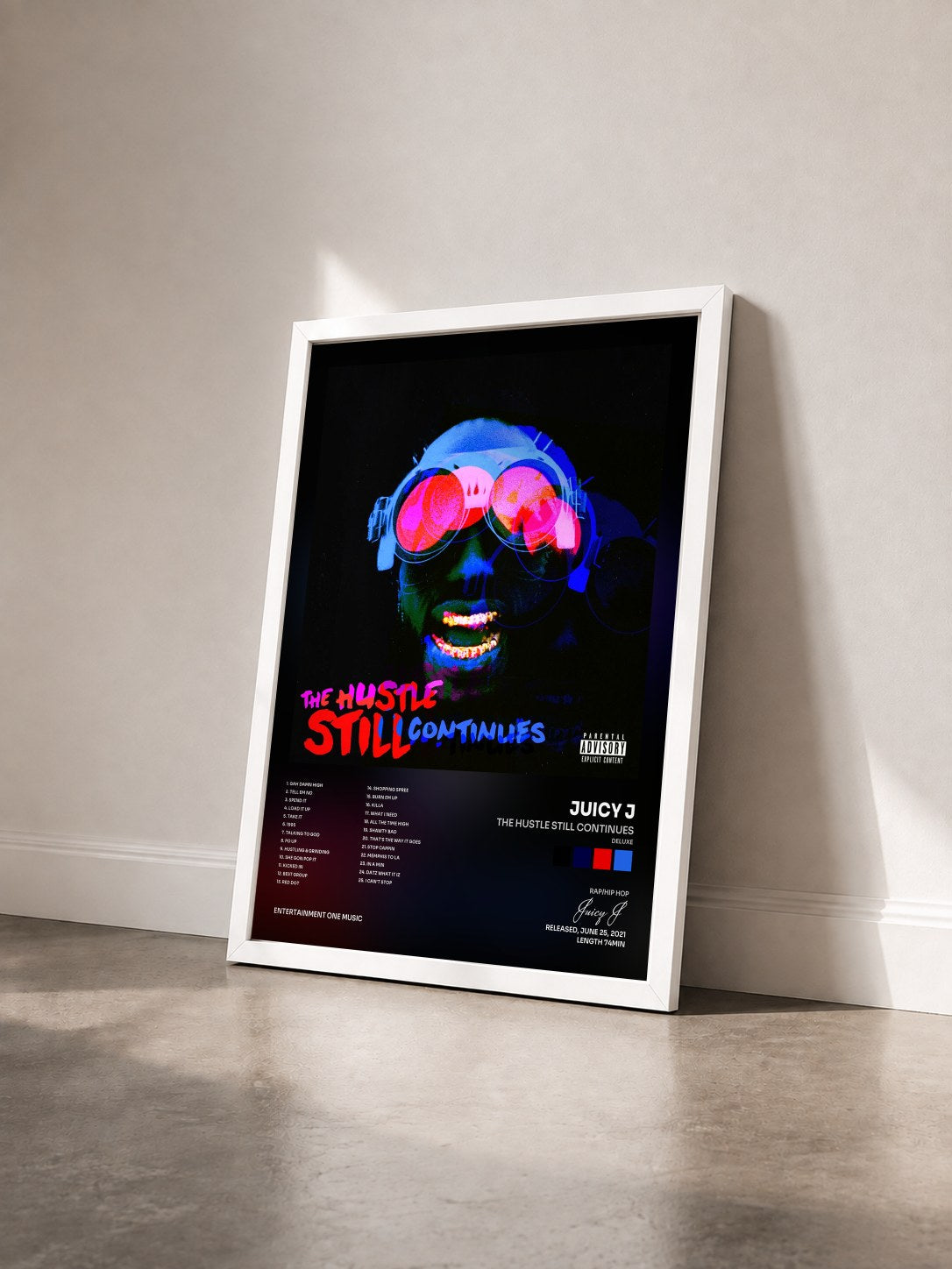 #blanc Tableau de l'album THE HUSTLE STILL CONTINUES (Deluxe) de Juicy J vu de trois quarts, cadre blanc
