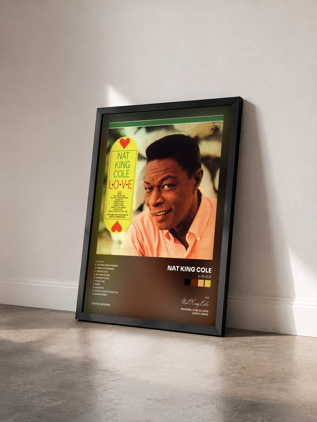 #noir L-O-V-E by Nat King Cole as a framed art print seen at an angle, black frame