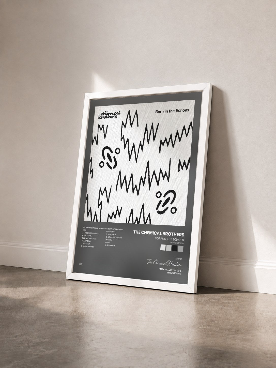 #blanc Tableau de l'album Born In The Echoes (Deluxe Edition) de The Chemical Brothers vu de trois quarts, cadre blanc