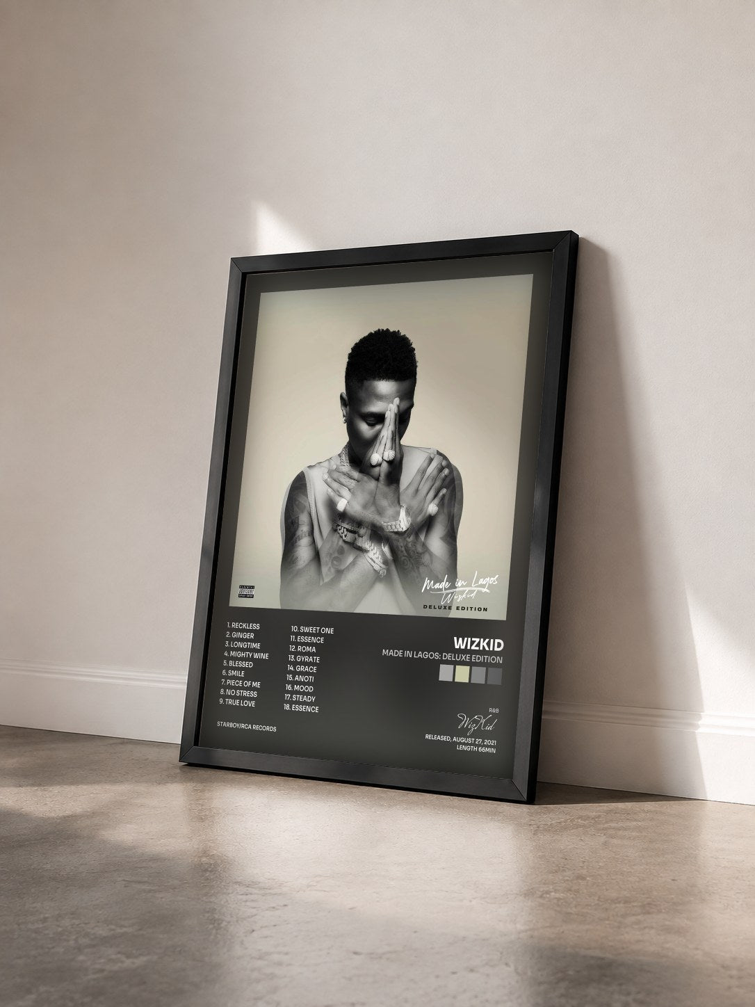 #noir Tableau de l'album Made In Lagos: Deluxe Edition de WizKid vu de trois quarts, cadre noir