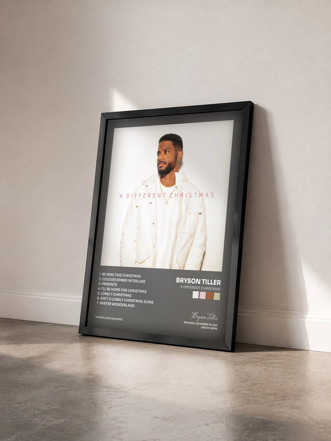#noir A Different Christmas by Bryson Tiller as a framed art print seen at an angle, black frame