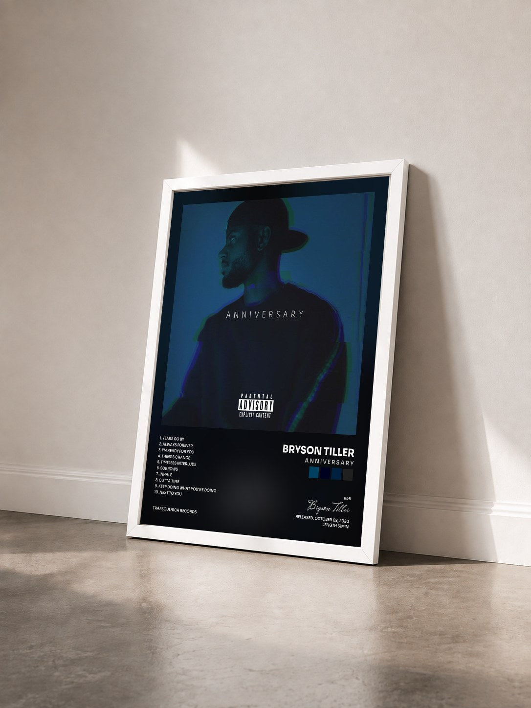 #blanc A N N I V E R S A R Y by Bryson Tiller as a framed art print seen at an angle, white frame
