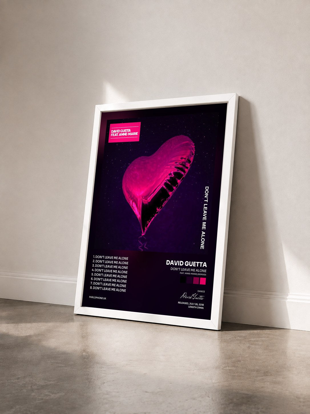 #blanc Tableau de l'album Don't Leave Me Alone (feat. Anne-Marie) (Remixes) de David Guetta vu de trois quarts, cadre blanc