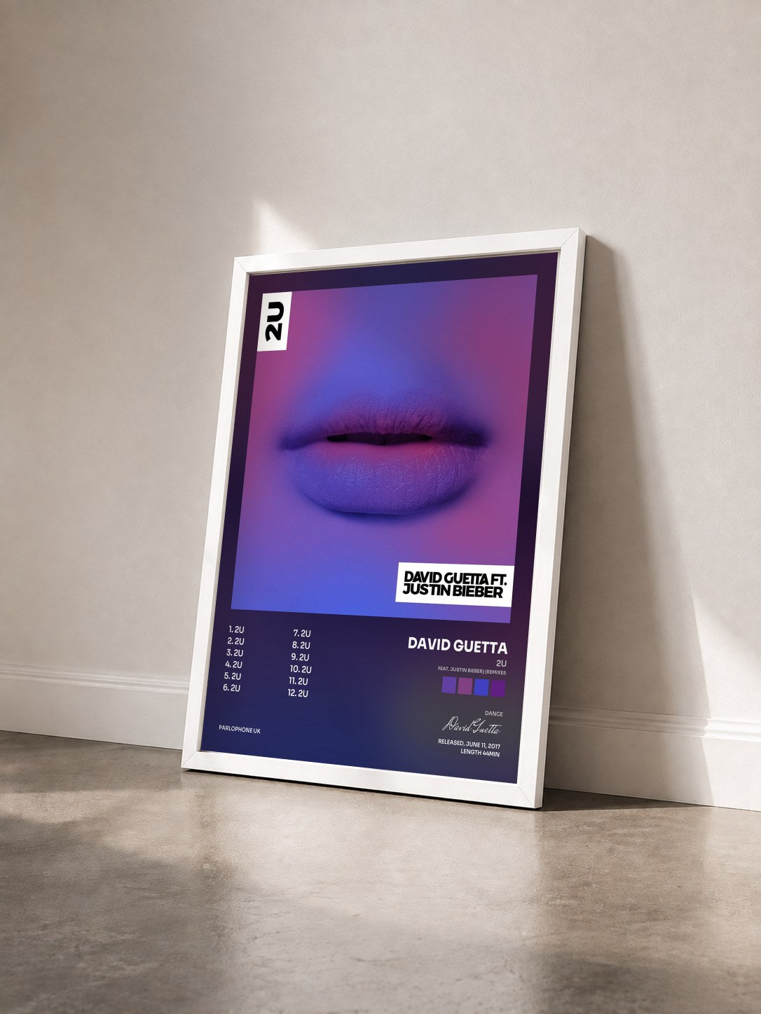 #blanc Tableau de l'album 2U (feat. Justin Bieber) (Remixes) de David Guetta vu de trois quarts, cadre blanc