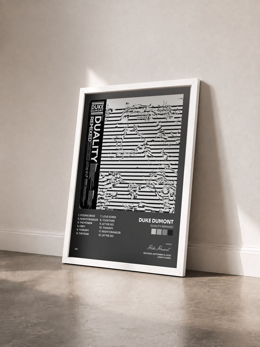 #blanc Tableau de l'album Duality Remixed de Duke Dumont vu de trois quarts, cadre blanc